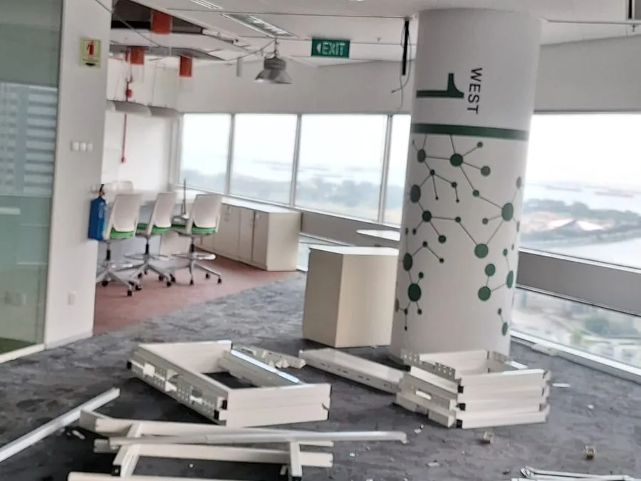 Cleared office floor with columns ready for make-good
